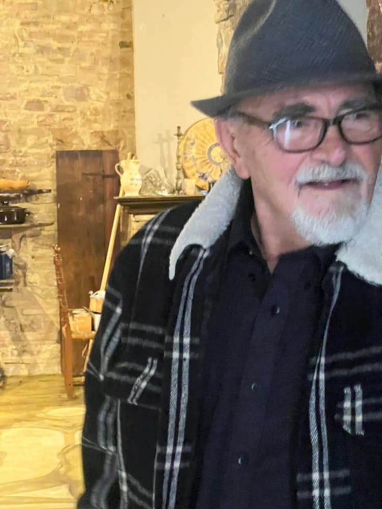 Artist Elvio Marchionni inside his stone home in Spello, Italy